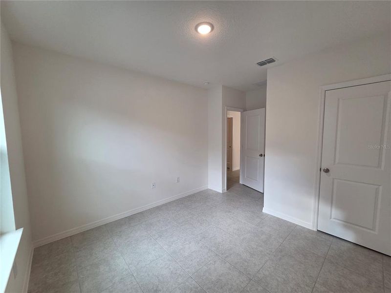 Spacious, unfurnished interior of a new home in Hammock Reserve, Haines City (Image 18). Spacious, unfurnished interior of a new home in Hammock Reserve, Haines City (Image 18).