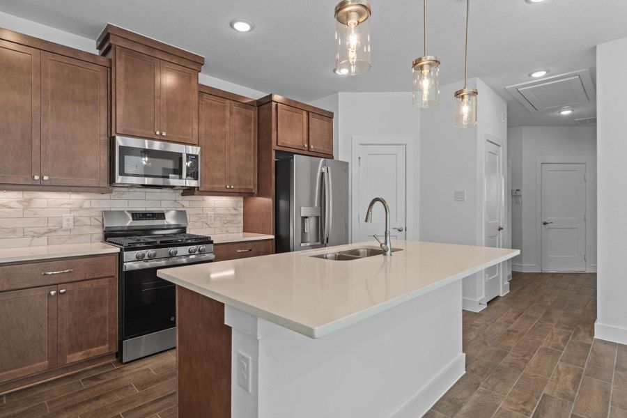 Furnished interior view inside a new home in Meridiana, Iowa Colony (Image 5).