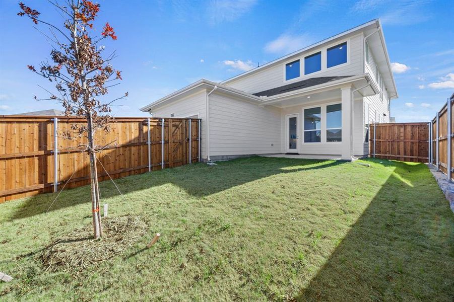 Exterior details and patio area of a home in The Heights at Uptown Celina, Celina (Image 2).