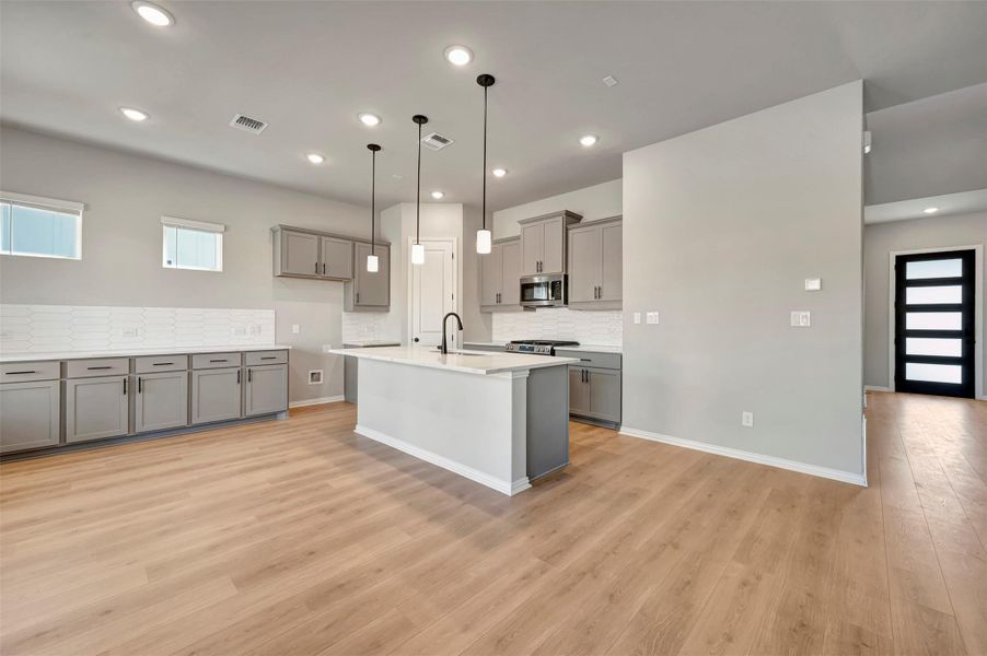 Furnished interior view inside a new home in Heritage, Dripping Springs (Image 6).