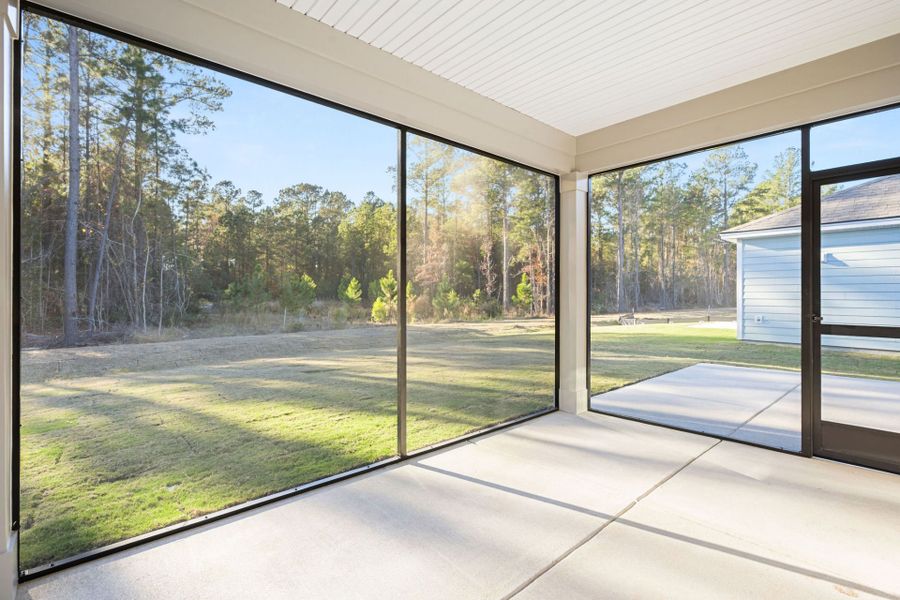 Exterior details and patio area of a home in Sun City Hilton Head, Bluffton (Image 3).