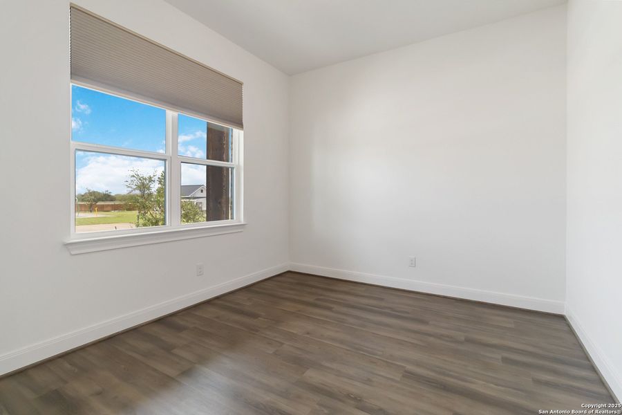 Spacious, unfurnished interior of a new home in Woodbridge Farms, La Vernia (Image 44).