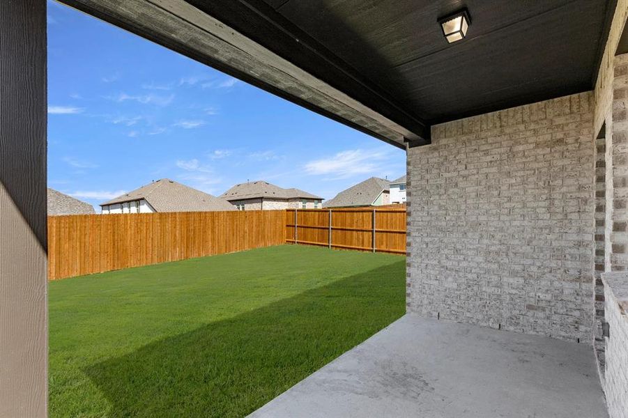 Exterior details and patio area of a home in Devonshire 40s, Forney (Image 3).