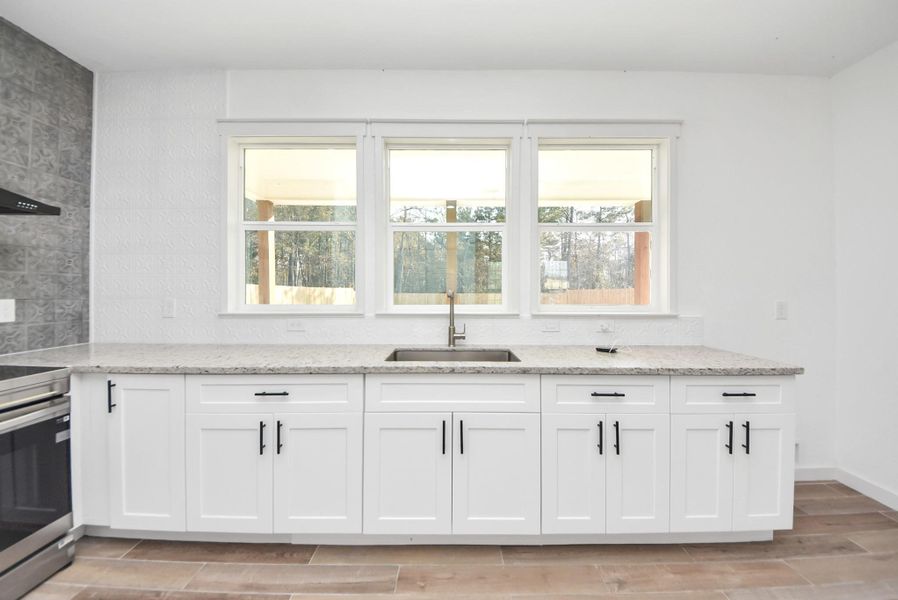 Furnished interior view inside a new home in , Conroe (Image 10).