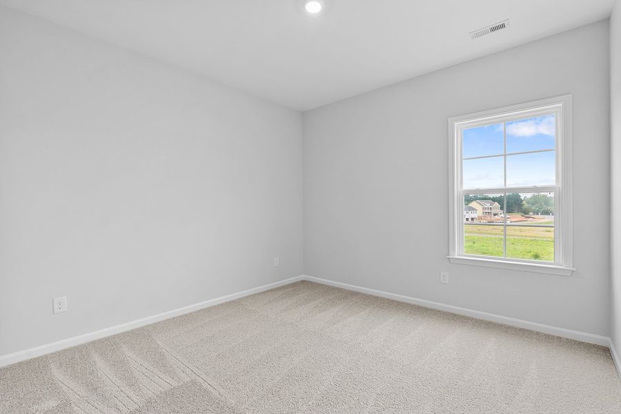Spacious, unfurnished interior of a new home in Lilah Grove, Summerfield (Image 38).
