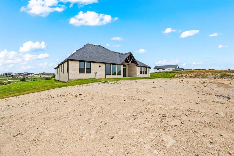 Exterior details and patio area of a home in Bella Crossing, Fort Worth (Image 4).