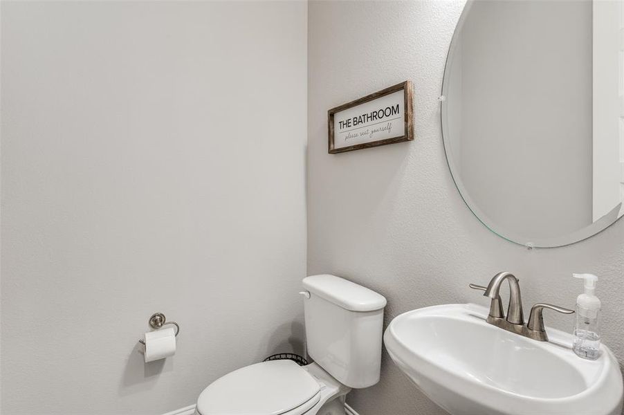 Bathroom with toilet and sink