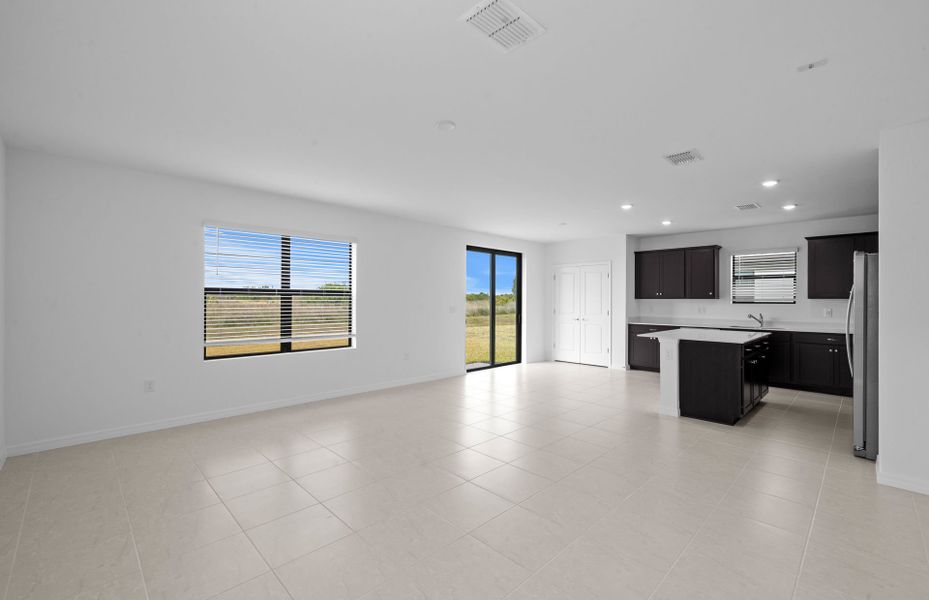 Spacious, unfurnished interior of a new home in Whispering Lakes, Lehigh Acres (Image 24).