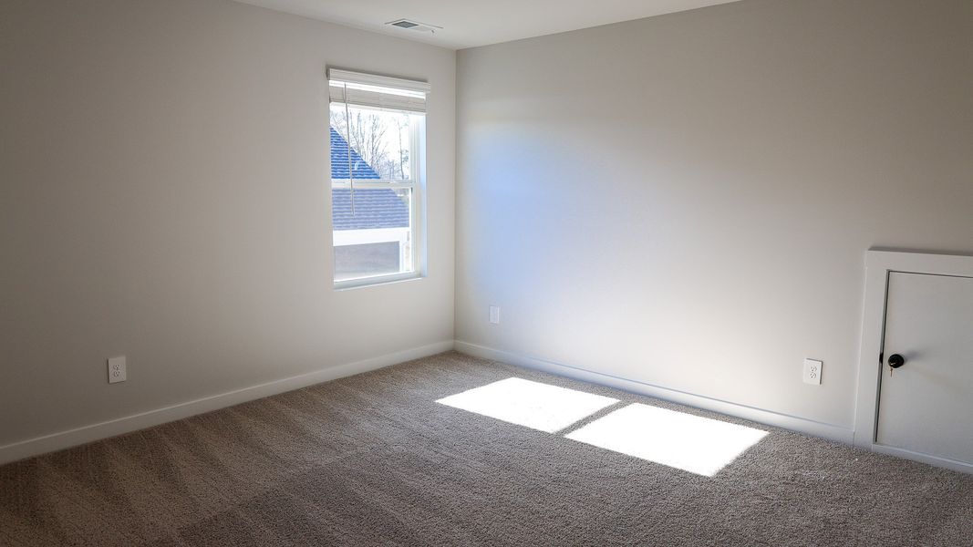 Representative unfurnished interior of a home built from the EMBRY by D.R. Horton in Harvest Point, Spring Hill (Image 39).