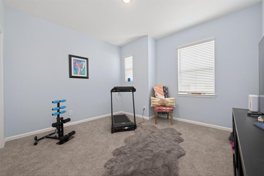 Bright secondary room offering flexible use options