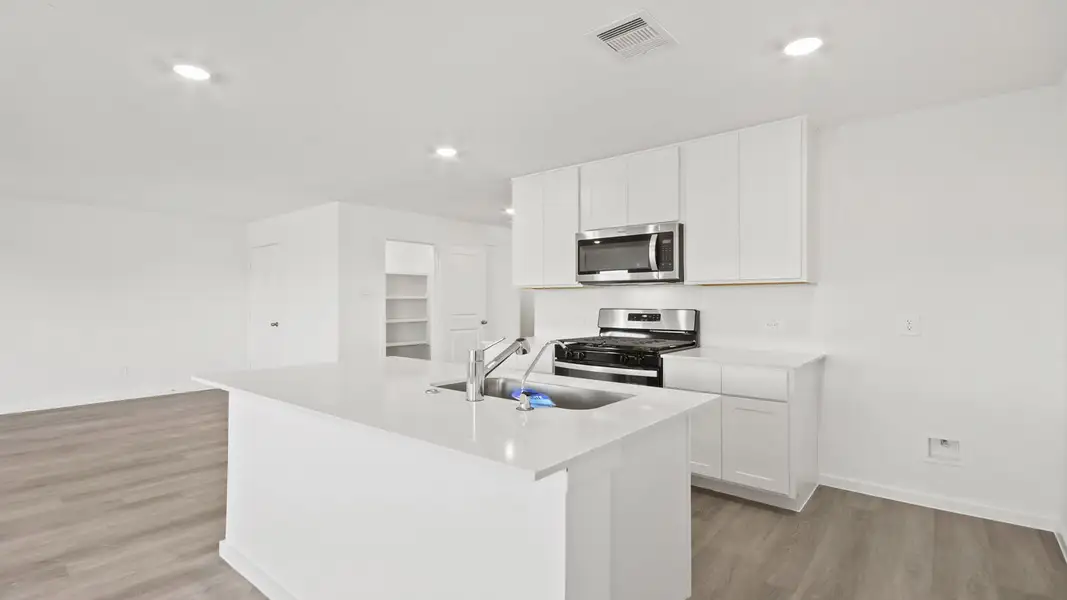 Furnished interior view inside a new home in Lexington Heights, Willis (Image 5).
