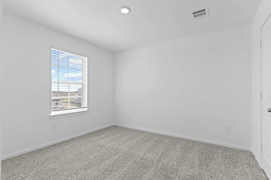 Spacious, unfurnished interior of a new home in Watermark, Alvin (Image 17). Spacious, unfurnished interior of a new home in Watermark, Alvin (Image 17).