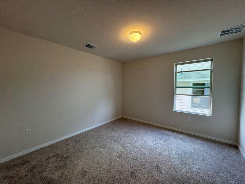 Spacious, unfurnished interior of a new home in Covered Bridge, Hutto (Image 32).