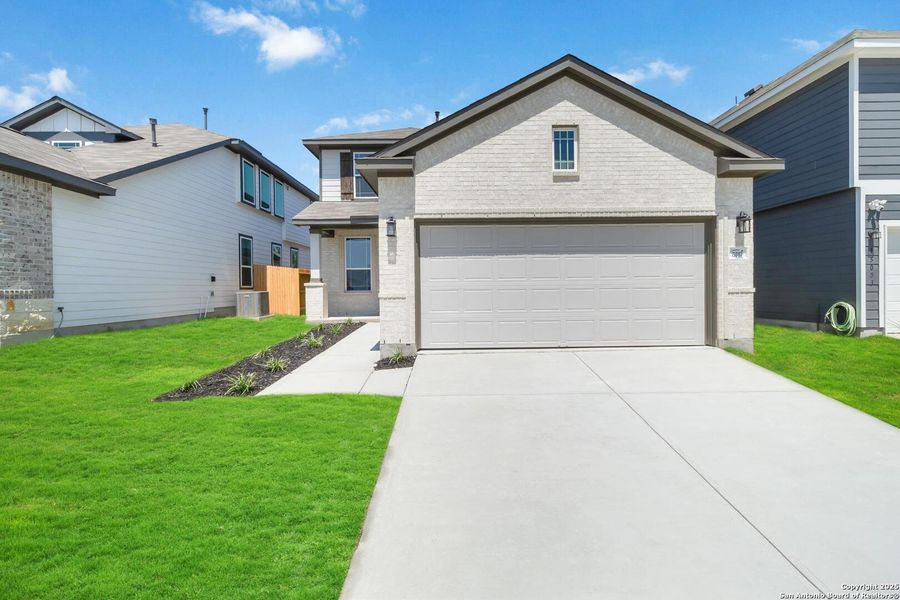 Front exterior of a new home in Timber Creek, San Antonio, TX, highlighting curb appeal (Image 16).