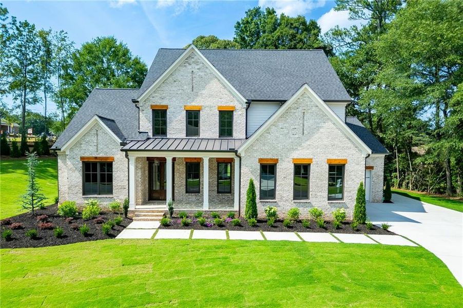 Front exterior of a new home in , Buford, GA, highlighting curb appeal (Image 35).
