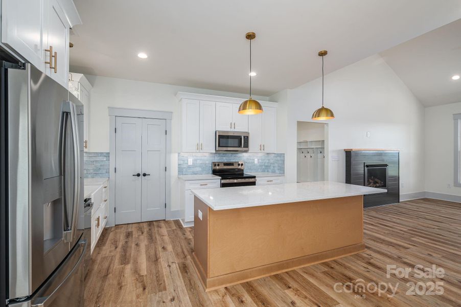 Furnished interior view inside a new home in , Vale (Image 8).