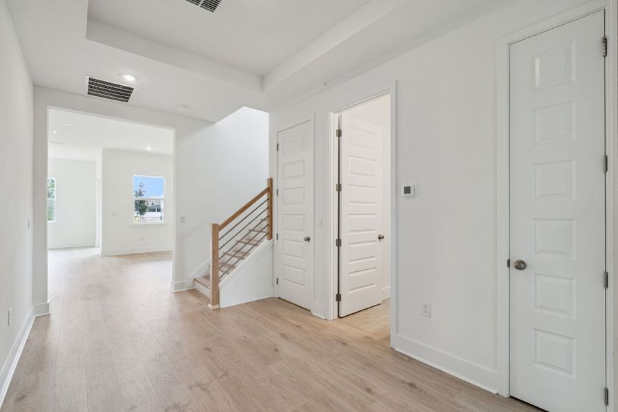 Spacious, unfurnished interior of a new home in Northlake at Ovation, Winter Garden (Image 15).
