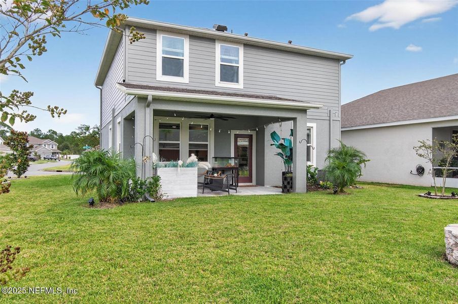 Exterior details and patio area of a home in Sawmill Creek at Palm Coast Park, Palm Coast (Image 24).