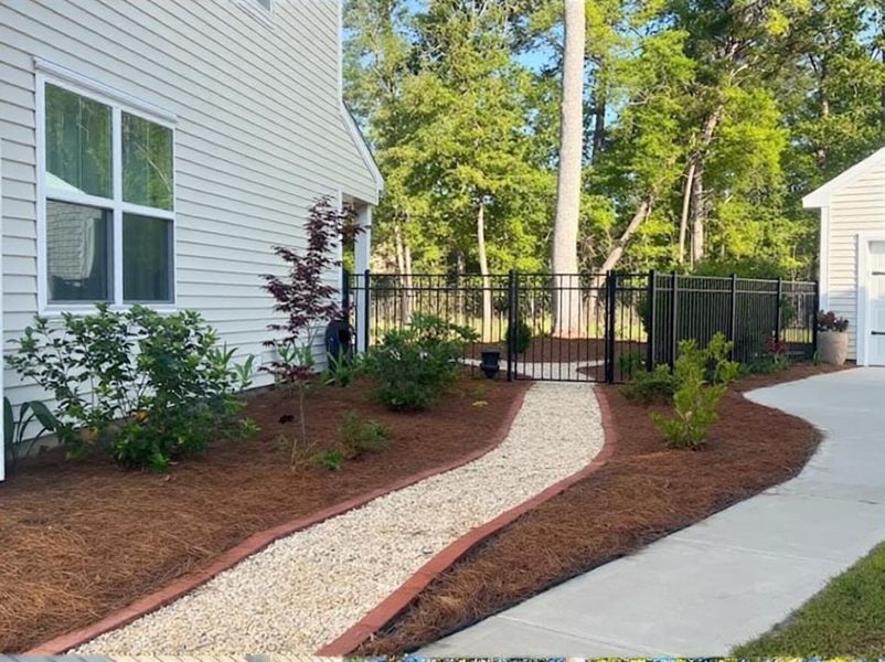 Exterior details and patio area of a home in , Okatie (Image 19).