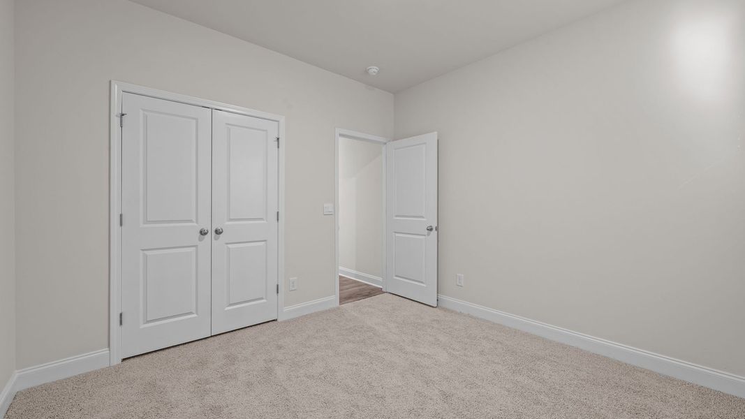 Spacious, unfurnished interior of a new home in Tyler - Home on the Lake, New Bern (Image 21).