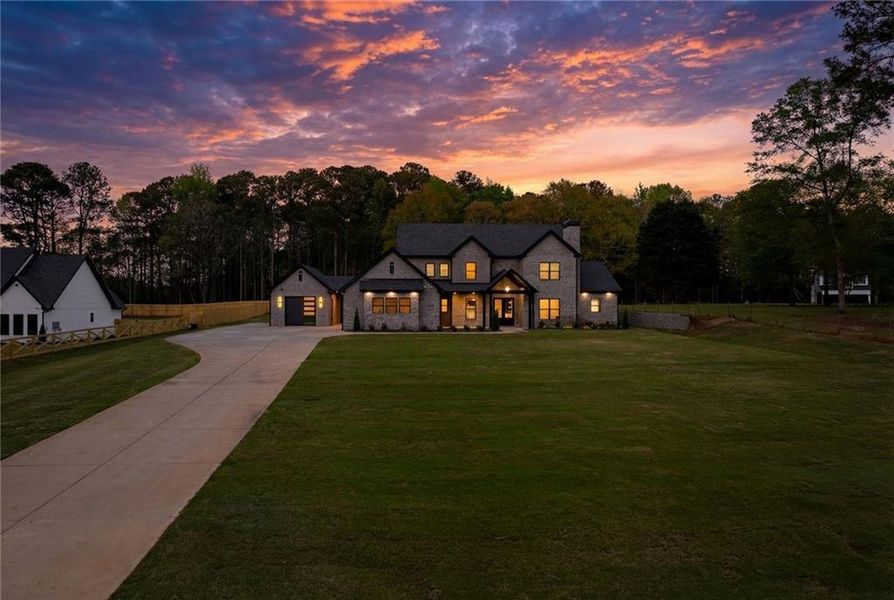 Front exterior of a new home in , Monroe, GA, highlighting curb appeal (Image 27). Front exterior of a new home in , Monroe, GA, highlighting curb appeal (Image 27).