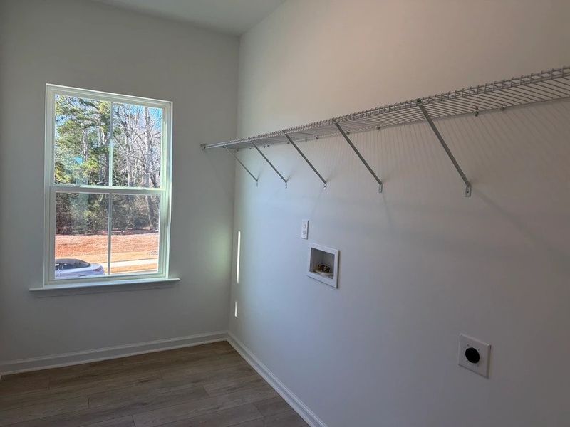 Laundry Room featuring the AW Collection® Sapphire - Bright whites and cool contrast keep it crisp.