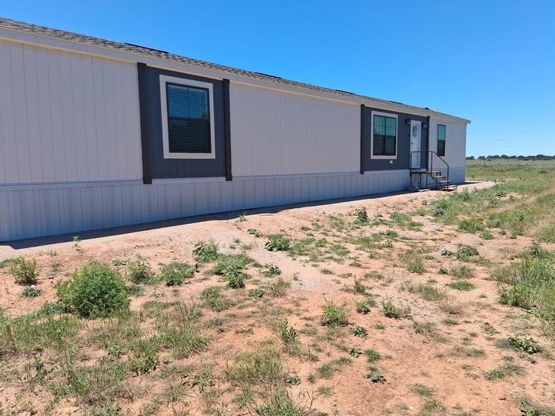 Exterior details and patio area of a home in , Rising Star (Image 1). Exterior details and patio area of a home in , Rising Star (Image 1).