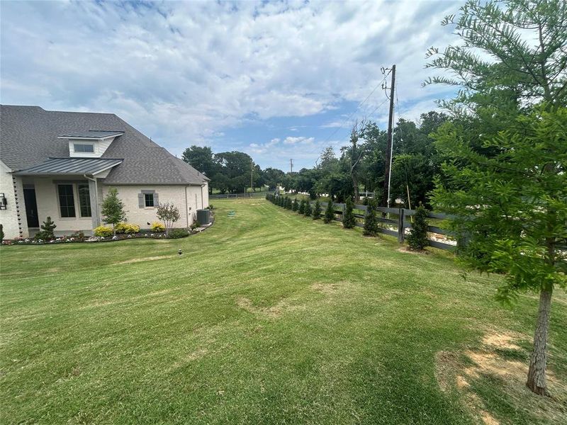 View of yard featuring central AC unit