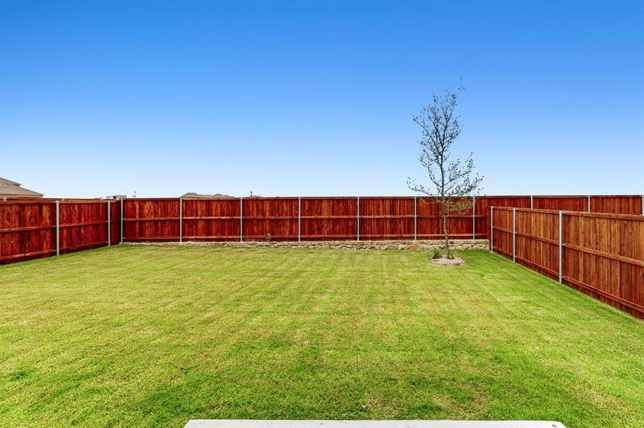 Front exterior of a new home in Lilybrooke at Legacy Hills, Celina, TX, highlighting curb appeal (Image 14).