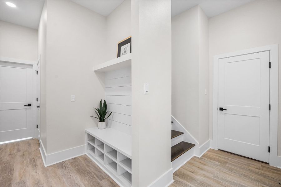 Mudroom Room with Access to Oversized Garage, Upstairs Game Room and Home Office or Can be a 5th Bedroom, Downstairs Half-Bath, and Direct Access from Laundry Room into Primary Closets Featuring "His and Hers" Closets with Custom Built-Ins.