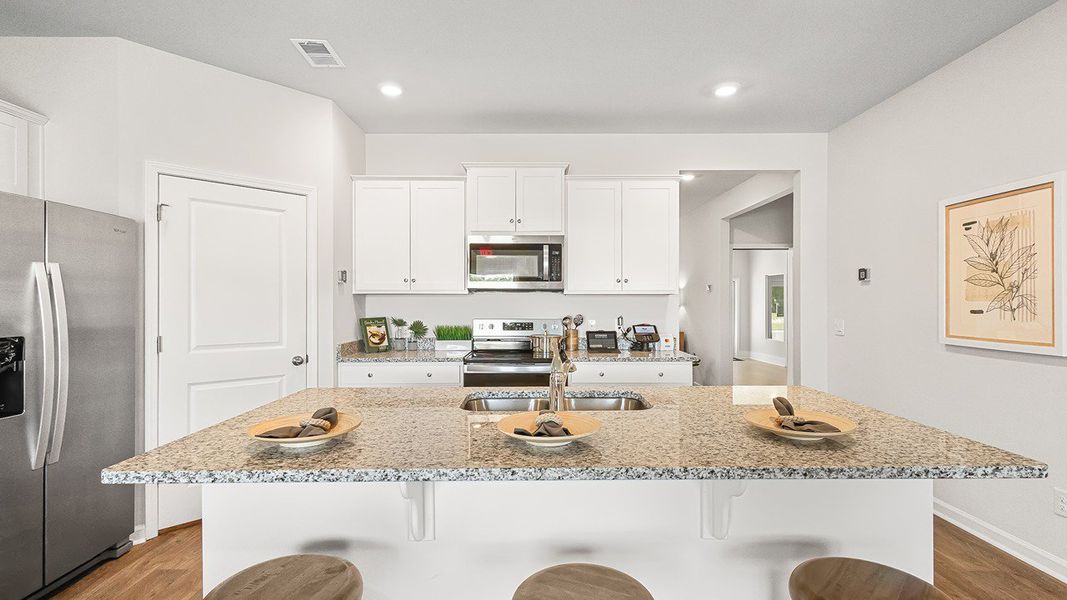 Furnished interior view inside a new home in Pine Hills at Cane Bay, Summerville (Image 4).