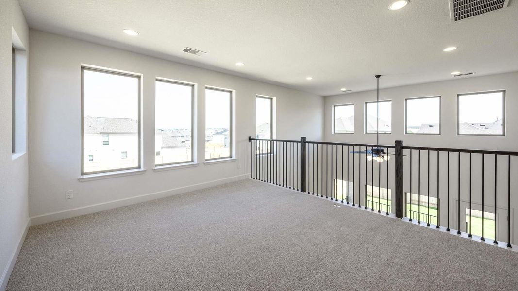 Spacious, unfurnished interior of a new home in Lariat 45', Liberty Hill (Image 10).