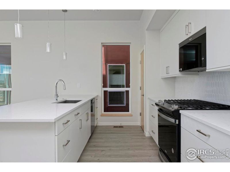 KitchenCraft cabinets and quartz counter tops in Kitchen