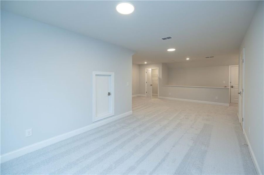 This home will also feature a media room and bedroom with full bath on the basement level. *Please note photos shown are of the Ellington plan but not of the actual home.