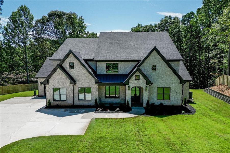 Front exterior of a new home in , Gainesville, GA, highlighting curb appeal (Image 10).
