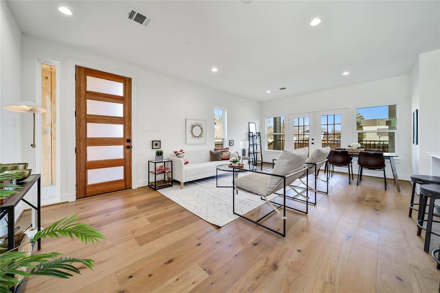 This photo was taken in another staged property with the same finishes and layout. Living Room.