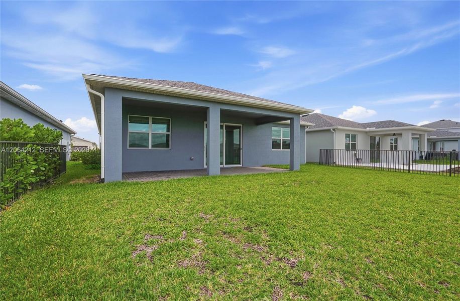 Exterior details and patio area of a home in Tradition, Port St. Lucie (Image 4).
