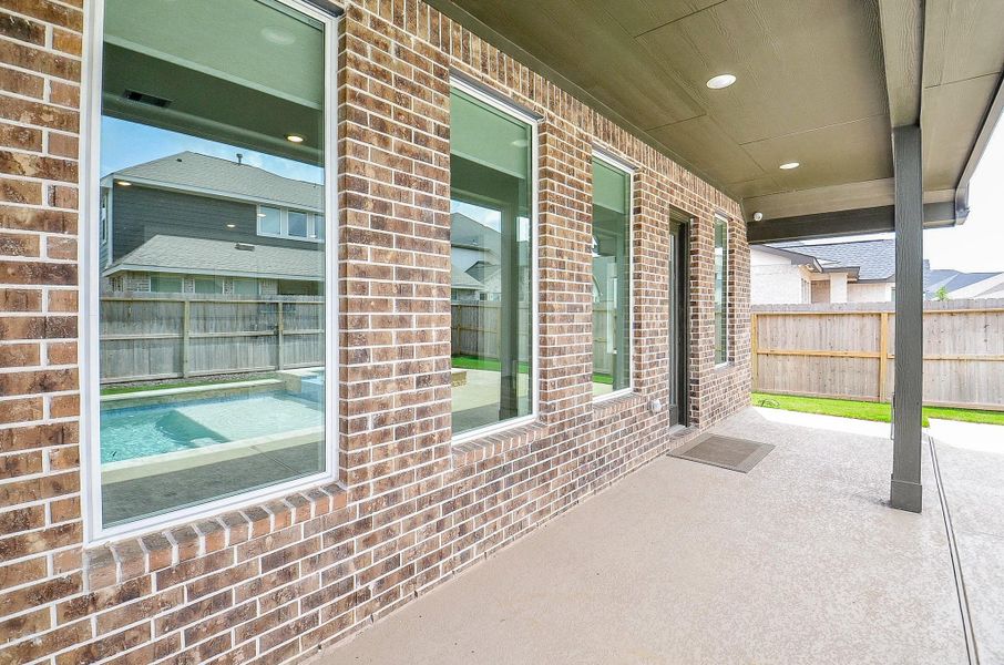 Spacious covered patio- a great place to relax!