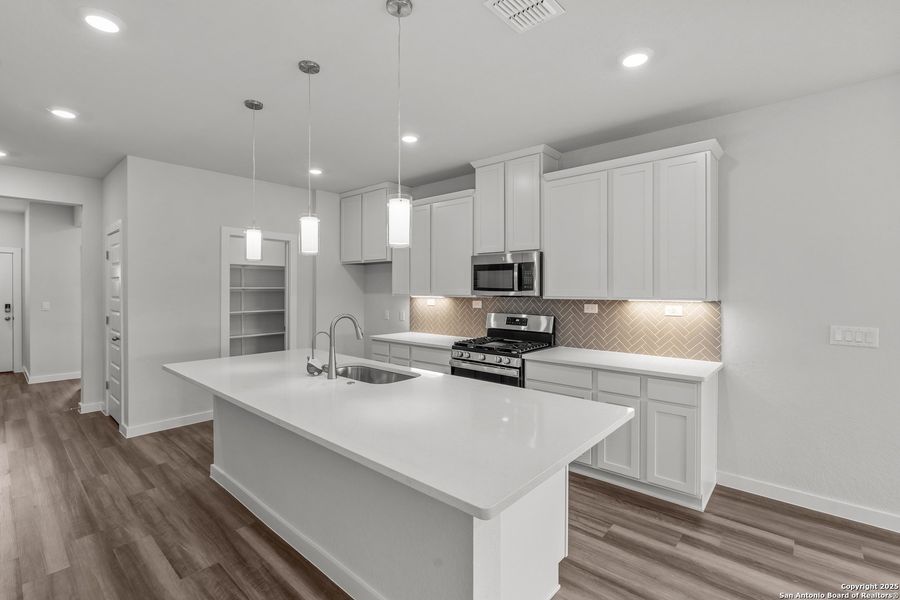 Furnished interior view inside a new home in August Fields, New Braunfels (Image 7).