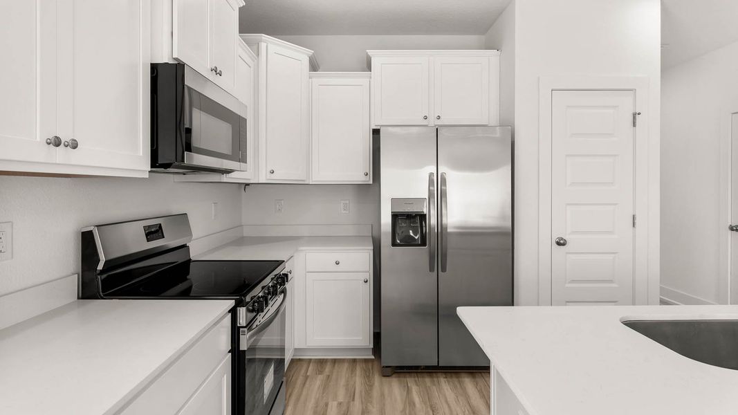 Furnished interior view inside a new home in Hawks Landing Townhomes, Santa Rosa Beach (Image 7).