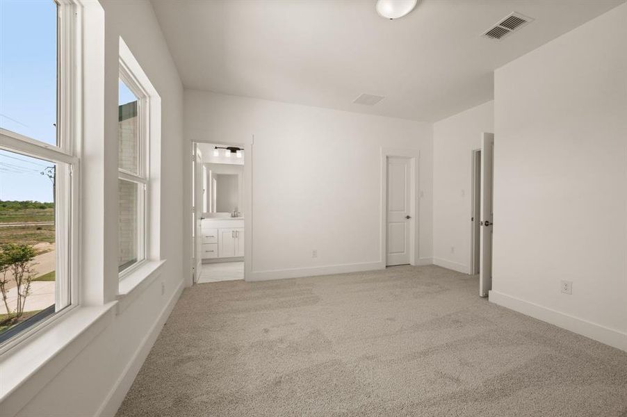 Our Bella plan offers a spacious secondary bedroom complete with en suite bath!