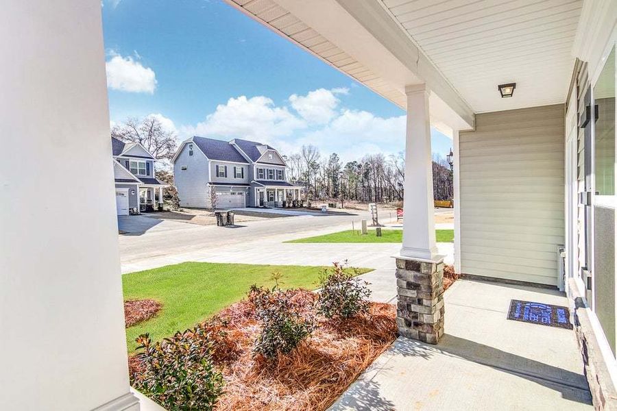Representative exterior photo of a completed home built from the Drayton by Caviness & Cates Communities in Bartlett Manor, Youngsville, NC (Image 15).