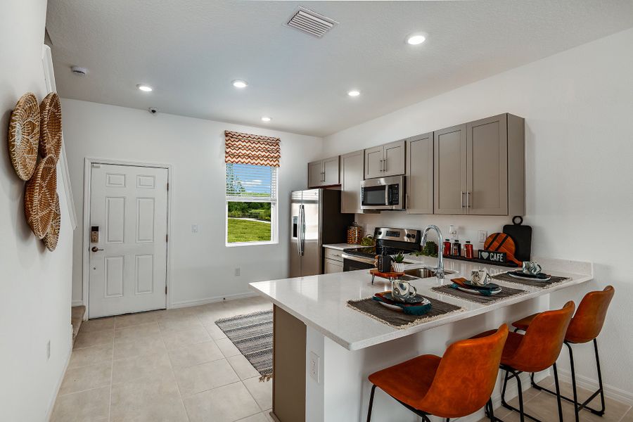 Furnished interior view inside a new home in The Townhomes at Azario Lakewood Ranch, Bradenton (Image 22).