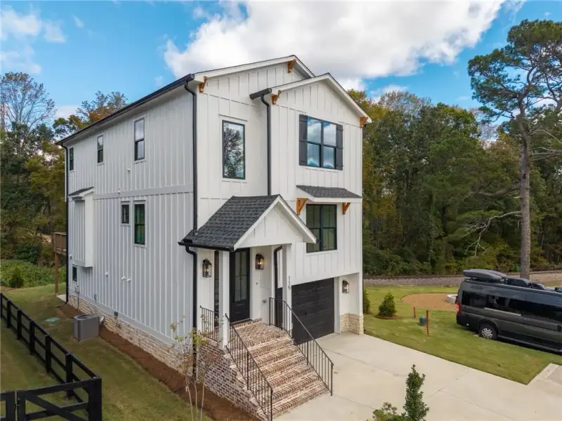 Front exterior of a new home in , Ball Ground, GA, highlighting curb appeal (Image 26).