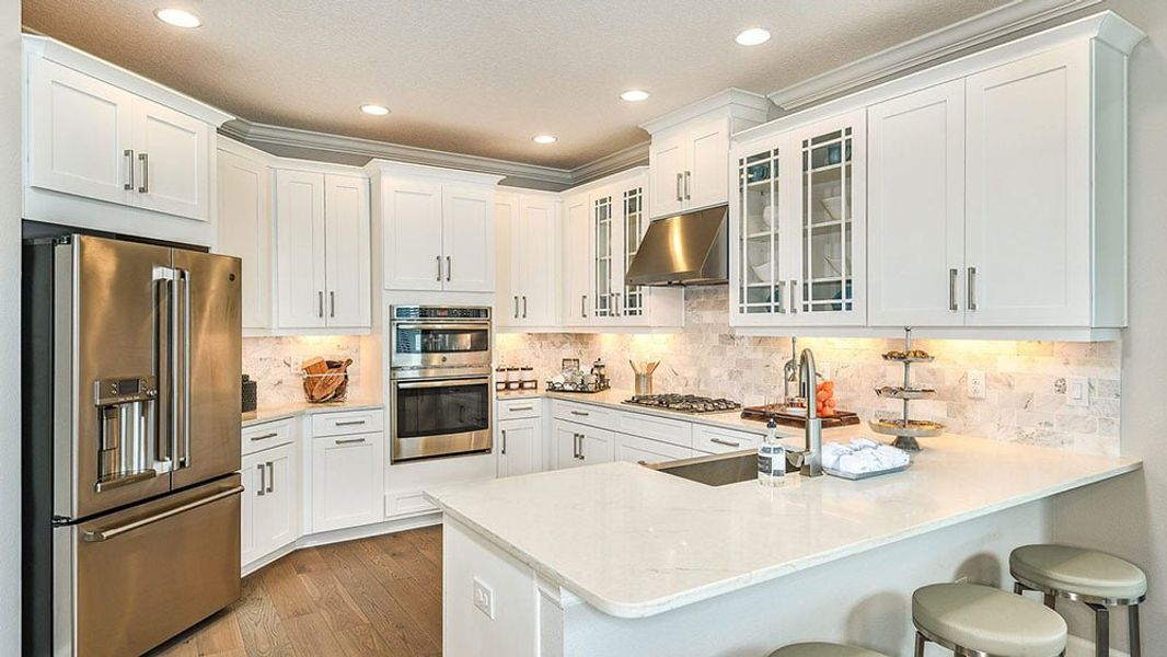 Representative furnished interior of a home built from the Anastasia by Taylor Morrison in Tiburon, Nokomis (Image 4).