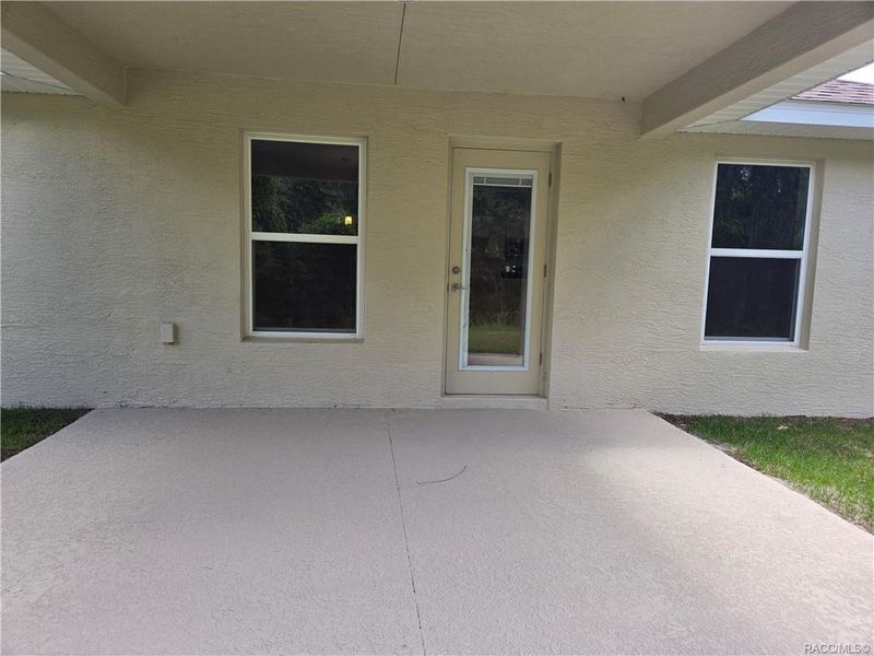 Exterior details and patio area of a home in Wyld Palms, Inverness (Image 2).