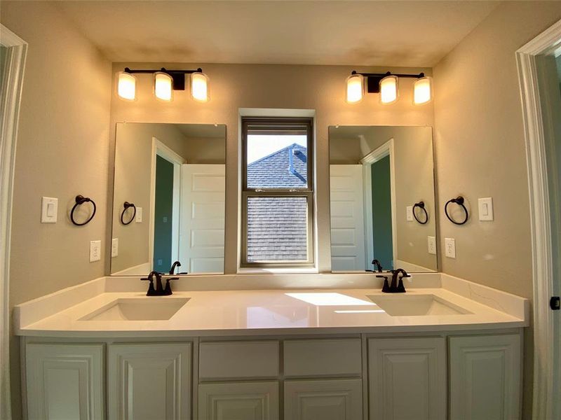 Jack & Jill bath 4 has separate dual vanity area making it easier to share Jack & Jill bath 4 has separate dual vanity area making it easier to share