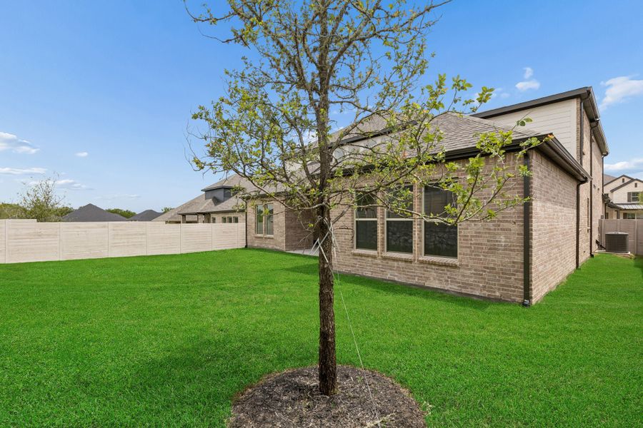 Exterior details and patio area of a home in Painted Tree Lakeside, McKinney (Image 22).