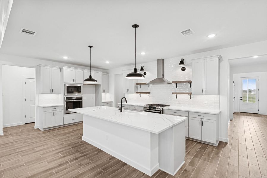 Gourmet island kitchen (*Photo not of actual home and used for illustration purposes only.)