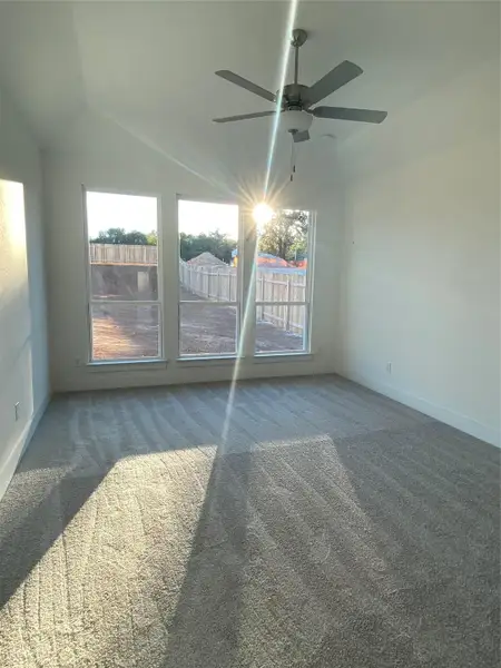 Primary Bedroom with elevated ceiling Primary Bedroom with elevated ceiling